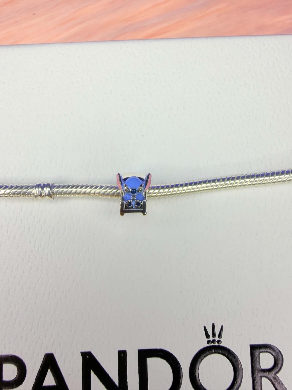 Pandora Blue Stitch Charm on Silver Snake Bracelet